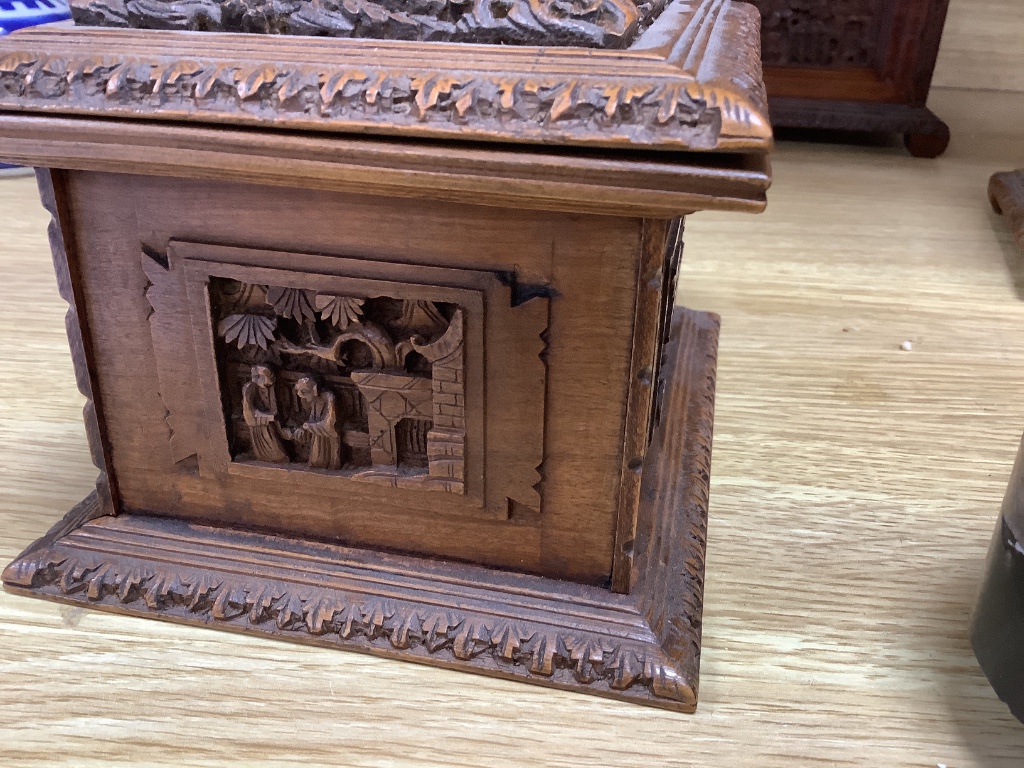 Three 19th century Chinese carved sandalwood caskets, longest 19cm